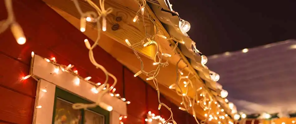 Close up of clear LED holiday lights on a house in Bryan, TX.