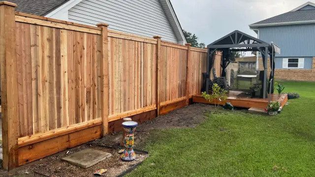 Custom Framed Cedar Fence Installation | Greener LawnScapes