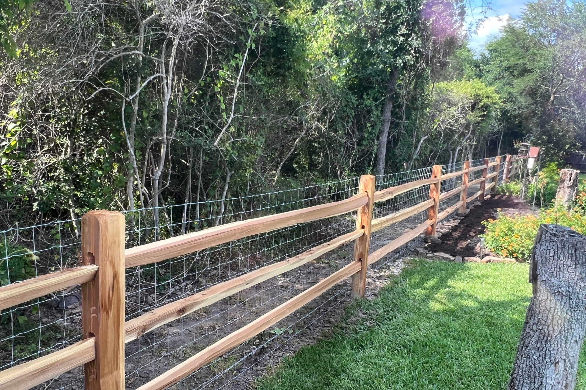 Split Rail Rough Cedar Fence Installation | Greener LawnScapes